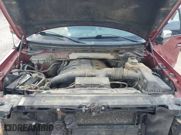 2013 Ford F-150 Lariat with VIN 1FTFW1ET7DKF18182, listed as a Copart auction lot 68183995 with 165,863 mi miles and Salvage title. Bid and sale history available at DreamBid. Image 11.