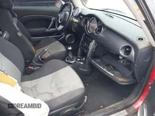 2006 MINI Hardtop with VIN WMWRC33516TK65263, listed as a IAAI auction lot 42003520 with 185,065 mi miles and . Bid and sale history available at DreamBid. Image 5.