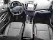 2018 Ford Escape SE z VIN 1FMCU9GD9JUA27475, wystawiony jako Copart lot #82301455 z przebiegiem 66 389 mil mil oraz Szkoda całkowita • Salvage title. Historia ofert i sprzedaży dostępna na DreamBid. Obrazek 8.