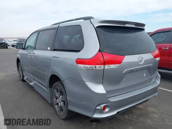 2014 Toyota Sienna SE with VIN 5TDXK3DC6ES421515, listed as a IAAI auction lot 43102179 with 63,756 mi miles and . Bid and sale history available at DreamBid. Image 3.