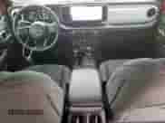 2024 Jeep Wrangler Willys with VIN 1C4RJXDN5RW351466, listed as a Copart auction lot 58553855 with 16,652 mi miles and Salvage title. Bid and sale history available at DreamBid. Image 8.