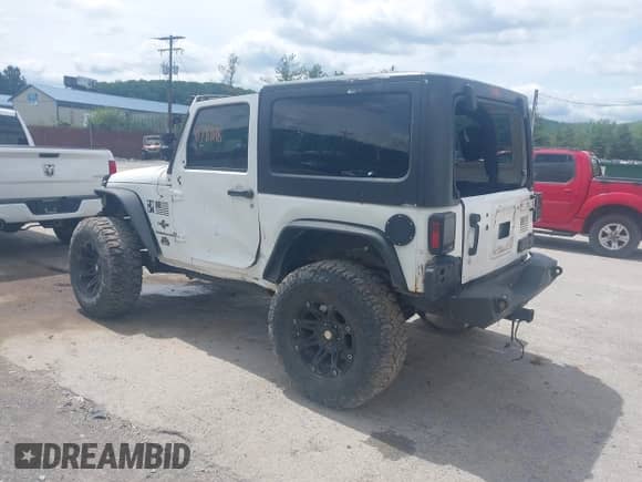 2012 Jeep Wrangler Sport с VIN 1C4AJWAG0CL289478, выставлен на аукционе IAAI как лот 41781118 с пробегом 127 299 миль миль и . История ставок и продаж доступна на DreamBid. Изображение 3.