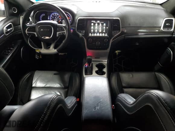 2016 Jeep Grand Cherokee SRT with VIN 1C4RJFDJ4GC503890, listed as a Copart auction lot 86642835 with 77,353 mi miles and Clean title. Bid and sale history available at DreamBid. Image 8.