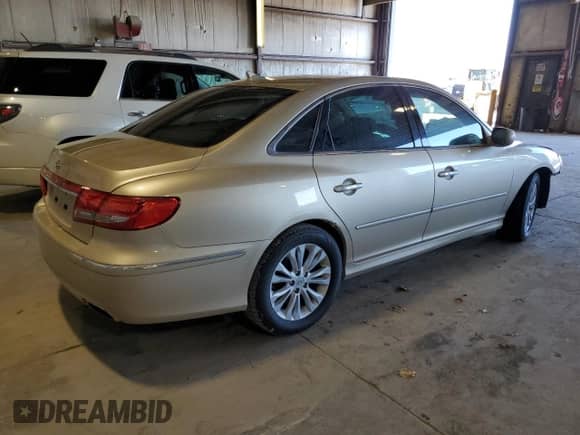 2011 Hyundai Azera GLS z VIN KMHFC4DD3BA533068, wystawiony jako Copart lot #81233384 z przebiegiem Nie podano mil oraz Szkoda całkowita • Salvage title. Historia ofert i sprzedaży dostępna na DreamBid. Obrazek 3.