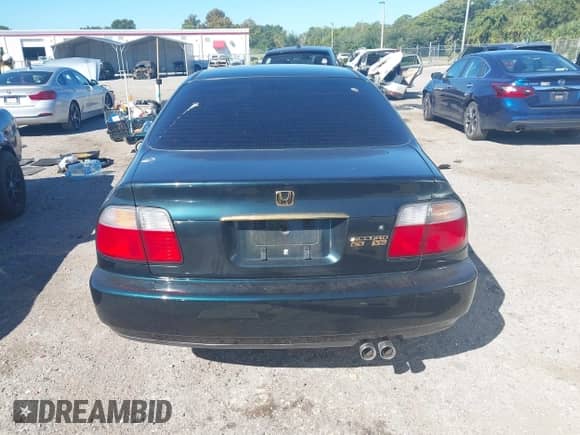 1996 Honda Accord EX z VIN 1HGCE6670TA006564, wystawiony jako IAAI lot #43471466 z przebiegiem 83 465 mil mil oraz . Historia ofert i sprzedaży dostępna na DreamBid. Obrazek 16.