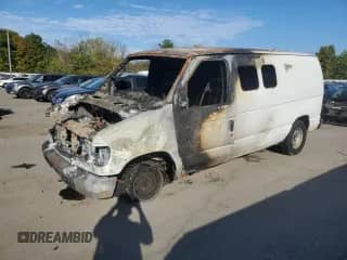 2003 Ford Econoline Cargo с VIN 1FTRE14243HA06948, выставлен на аукционе Copart как лот 82227735 с пробегом Не указан миль и Списание • Salvage title. История ставок и продаж доступна на DreamBid. Изображение 1.