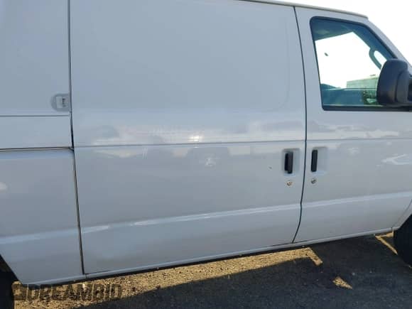 2013 Ford Econoline Cargo Commercial with VIN 1FTSE3EL0DDA97956, listed as a IAAI auction lot 43322942 with 184,511 mi miles and . Bid and sale history available at DreamBid. Image 6.