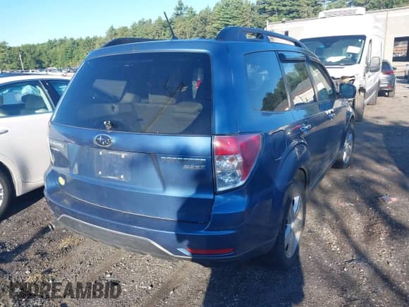 2010 Subaru Forester X Premium z VIN JF2SH6CC2AH731852, wystawiony jako IAAI lot #43049665 z przebiegiem 156 916 mil mil oraz . Historia ofert i sprzedaży dostępna na DreamBid. Obrazek 4.
