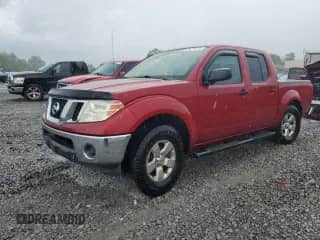 2010 Nissan Frontier SE with VIN 1N6AD0ER6AC406815, listed as a Copart auction lot 84967965 with 231,662 mi miles and Salvage title. Bid and sale history available at DreamBid. Image 1.