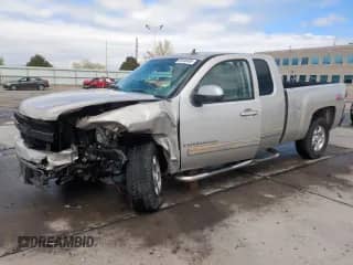 2007 Chevrolet Silverado 1500 LTZ with VIN 1GCEK19077Z643024, listed as a Copart auction lot 52526455 with 122,460 mi miles and Salvage title. Bid and sale history available at DreamBid. Image 1.