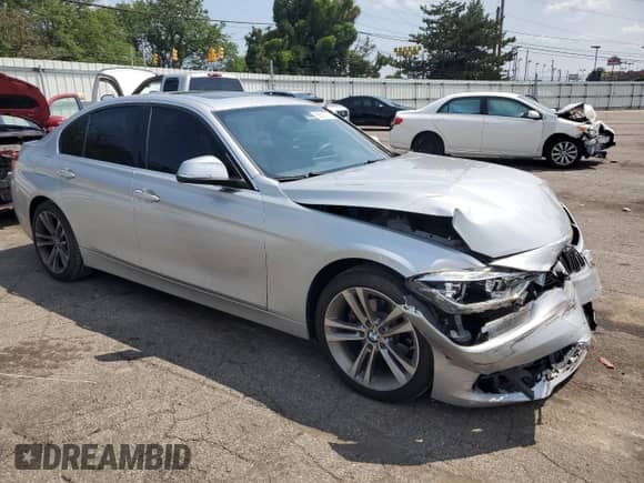 2017 BMW 3 Series 330i xDrive with VIN WBA8D9C38HA004785, listed as a Copart auction lot 66630725 with 50,040 mi miles and Salvage title. Bid and sale history available at DreamBid. Image 4.
