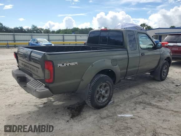 2003 Nissan Frontier XE z VIN 1N6ED26T23C452359, wystawiony jako Copart lot #70995355 z przebiegiem 168 490 mil mil oraz Szkoda całkowita • Salvage title. Historia ofert i sprzedaży dostępna na DreamBid. Obrazek 3.