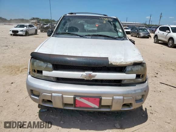 2005 Chevrolet TrailBlazer LT с VIN 1GNDS13S052340475, выставлен на аукционе Copart как лот 67266245 с пробегом Не указан миль и Списание • Salvage title. История ставок и продаж доступна на DreamBid. Изображение 5.