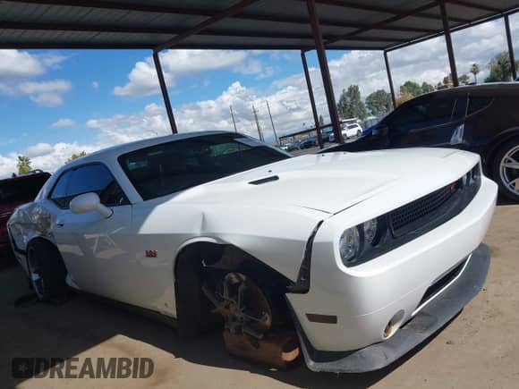 2012 Dodge Challenger SRT-8 392 с VIN 2C3CDYCJ1CH243924, выставлен на аукционе IAAI как лот 43368898 с пробегом 74 909 миль миль и . История ставок и продаж доступна на DreamBid. Изображение 14.