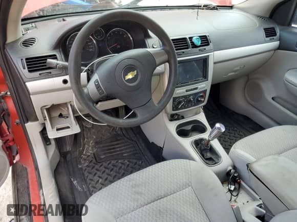 2010 Chevrolet Cobalt z VIN 1G1AC1F51A7113090, wystawiony jako Copart lot #59091205 z przebiegiem 119 073 mil mil oraz Szkoda całkowita • Salvage title. Historia ofert i sprzedaży dostępna na DreamBid. Obrazek 8.