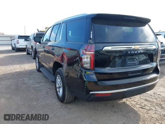 2023 Chevrolet Tahoe LT z VIN 1GNSCNKD9PR191296, wystawiony jako IAAI lot #41814835 z przebiegiem 64 777 mil mil oraz . Historia ofert i sprzedaży dostępna na DreamBid. Obrazek 3.