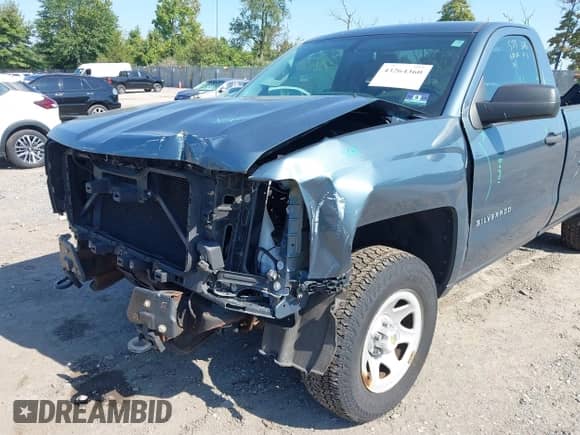 2014 Chevrolet Silverado 1500 Work Truck with VIN 1GCNKPEC8EZ124743, listed as a IAAI auction lot 43264360 with 76,776 mi miles and . Bid and sale history available at DreamBid. Image 18.