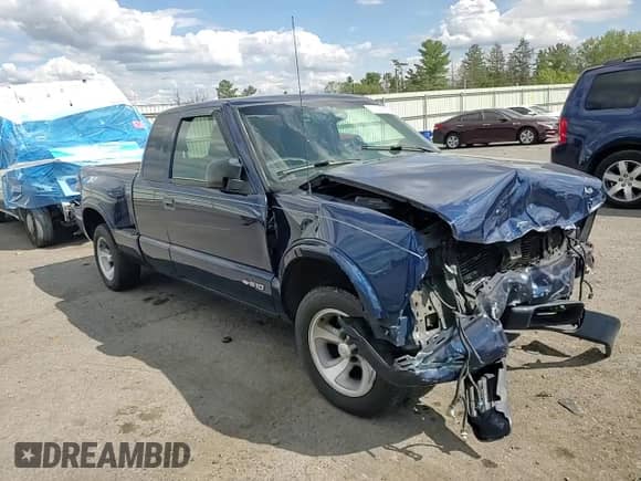 1999 Chevrolet S-10 LS с VIN 1GCCS19X7X8142189, выставлен на аукционе Copart как лот 71218815 с пробегом Не указан миль и Списание • Salvage title. История ставок и продаж доступна на DreamBid. Изображение 14.