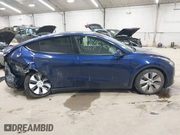 2021 Tesla Model Y Long Range with VIN 5YJYGDEE2MF159264, listed as a IAAI auction lot 43167588 with 83,012 mi miles and . Bid and sale history available at DreamBid. Image 14.