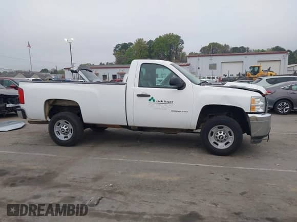 2012 Chevrolet Silverado 2500HD Work Truck z VIN 1GB0CVCG8CF145676, wystawiony jako IAAI lot #41835188 z przebiegiem 88 412 mil mil oraz . Historia ofert i sprzedaży dostępna na DreamBid. Obrazek 13.