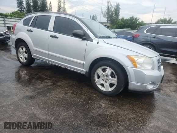 2007 Dodge Caliber SXT with VIN 1B3HB48B27D166521, listed as a Copart auction lot 72051485 with Not provided miles and Salvage title. Bid and sale history available at DreamBid. Image 4.