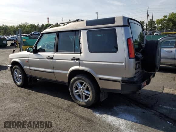 2003 Land Rover Discovery SE with VIN SALTY16483A788166, listed as a Copart auction lot 65641375 with 204,792 mi miles and Salvage title. Bid and sale history available at DreamBid. Image 2.