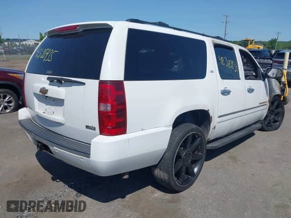 2009 Chevrolet Suburban LTZ z VIN 1GNFK36339R200149, wystawiony jako IAAI lot #42385935 z przebiegiem Nie podano mil oraz . Historia ofert i sprzedaży dostępna na DreamBid. Obrazek 4.