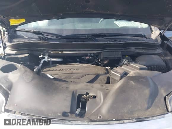 2022 Honda Pilot Elite z VIN 5FNYF6H0XNB014165, wystawiony jako IAAI lot #41196850 z przebiegiem 107 032 mil mil oraz . Historia ofert i sprzedaży dostępna na DreamBid. Obrazek 10.