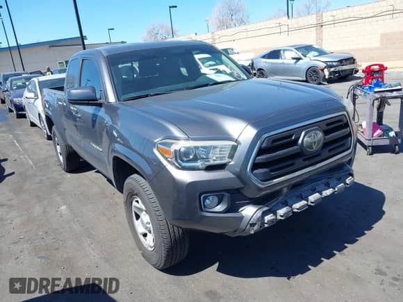 2018 Toyota Tacoma SR with VIN 5TFRX5GN1JX118441, listed as a IAAI auction lot 41870266 with 95,612 mi miles and . Bid and sale history available at DreamBid. Image 1.