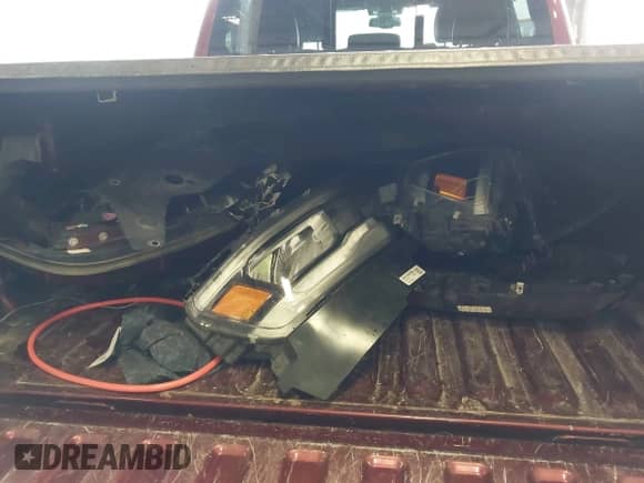 2019 Ram 1500 Laramie with VIN 1C6SRFJT6KN787172, listed as a IAAI auction lot 42407429 with 124,180 mi miles and . Bid and sale history available at DreamBid. Image 12.