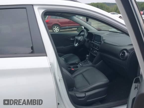 2019 Hyundai Kona Limited z VIN KM8K3CA56KU238812, wystawiony jako IAAI lot #43029492 z przebiegiem 54 943 mil mil oraz . Historia ofert i sprzedaży dostępna na DreamBid. Obrazek 5.