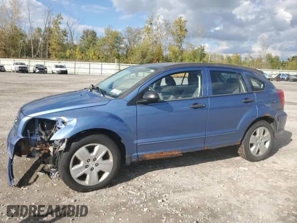 2007 Dodge Caliber SXT with VIN 1B3HB48B57D218885, listed as a Copart auction lot 83769795 with 104,586 mi miles and Salvage title. Bid and sale history available at DreamBid. Image 1.