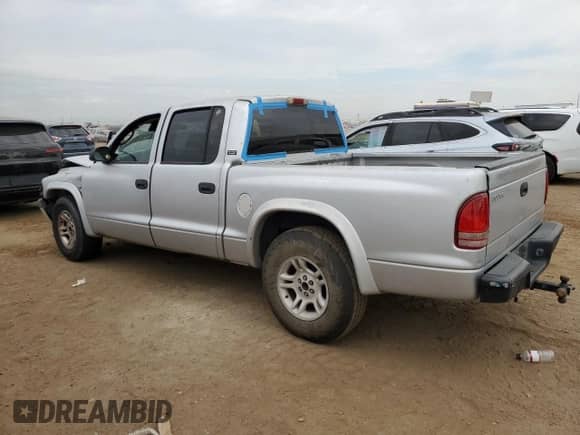 2001 Dodge Dakota Sport with VIN 1B7GL2AX21S214135, listed as a Copart auction lot 68122145 with 246,527 mi miles and Salvage title. Bid and sale history available at DreamBid. Image 2.