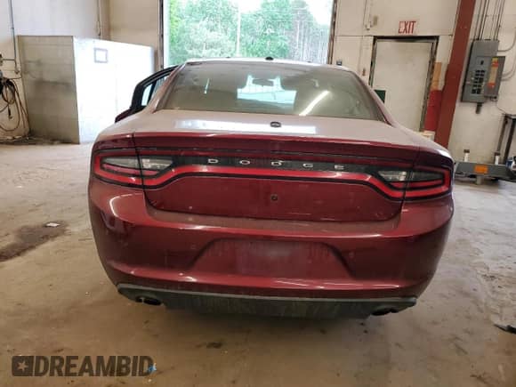 2021 Dodge Charger Police с VIN 2C3CDXKG7MH549396, выставлен на аукционе Copart как лот 57158135 с пробегом 98 447 миль миль и Списание • Salvage title. История ставок и продаж доступна на DreamBid. Изображение 6.