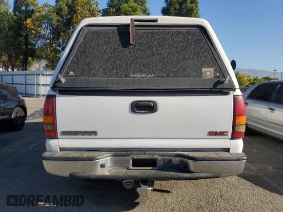 2002 GMC Sierra 1500 SLE1 z VIN 1GTEC19TX2E216332, wystawiony jako Copart lot #71175735 z przebiegiem Nie podano mil oraz Szkoda całkowita • Salvage title. Historia ofert i sprzedaży dostępna na DreamBid. Obrazek 6.