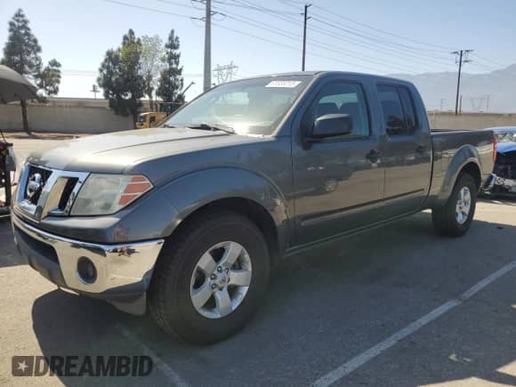 2009 Nissan Frontier LE z VIN 1N6AD09UX9C416211, wystawiony jako Copart lot #61655315 z przebiegiem 344 390 mil mil oraz Szkoda całkowita • Salvage title. Historia ofert i sprzedaży dostępna na DreamBid. Obrazek 1.