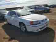 2001 Pontiac Grand Am GT с VIN 1G2NW12E91M512826, выставлен на аукционе Copart как лот 71748504 с пробегом 91 761 миль миль и На запчасти • Non repairable. История ставок и продаж доступна на DreamBid. Изображение 4.