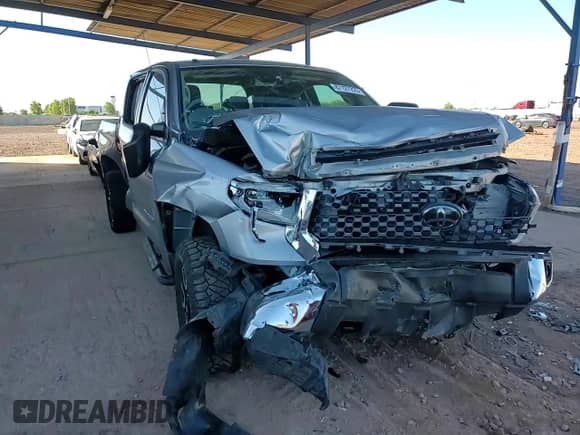 2018 Toyota Tundra SR5 z VIN 5TFDY5F15JX722094, wystawiony jako Copart lot #87127225 z przebiegiem 54 044 mil mil oraz Szkoda całkowita • Salvage title. Historia ofert i sprzedaży dostępna na DreamBid. Obrazek 14.
