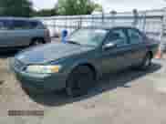 1999 Toyota Camry LE z VIN 4T1BG22K7XU443923, wystawiony jako Copart lot #61206005 z przebiegiem 265 239 mil mil oraz Czysty tytuł • Clean title. Historia ofert i sprzedaży dostępna na DreamBid. Obrazek 1.