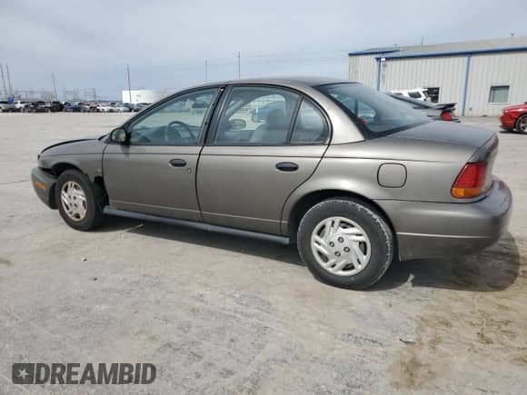 1998 Saturn SL с VIN 1G8ZH5285WZ232379, выставлен на аукционе Copart как лот 48181765 с пробегом 114 512 миль миль и Списание • Salvage title. История ставок и продаж доступна на DreamBid. Изображение 2.