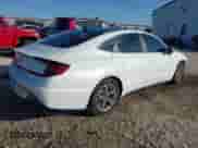 2021 Hyundai Sonata SEL z VIN 5NPEF4JA1MH094577, wystawiony jako IAAI lot #43380708 z przebiegiem 71 516 mil mil oraz . Historia ofert i sprzedaży dostępna na DreamBid. Obrazek 4.