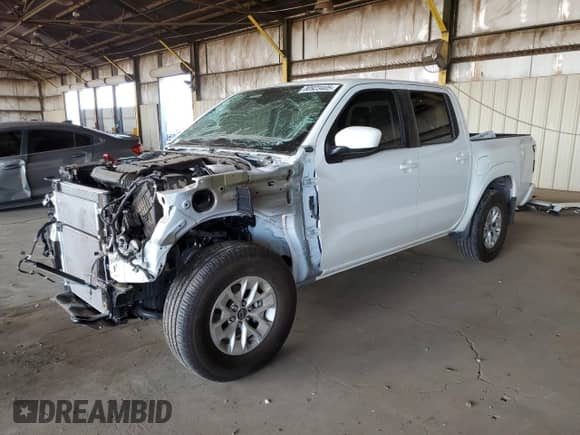 2024 Nissan Frontier Pro-4X with VIN 1N6ED1EK1RN618516, listed as a Copart auction lot 80923405 with 15,257 mi miles and Salvage title. Bid and sale history available at DreamBid. Image 1.