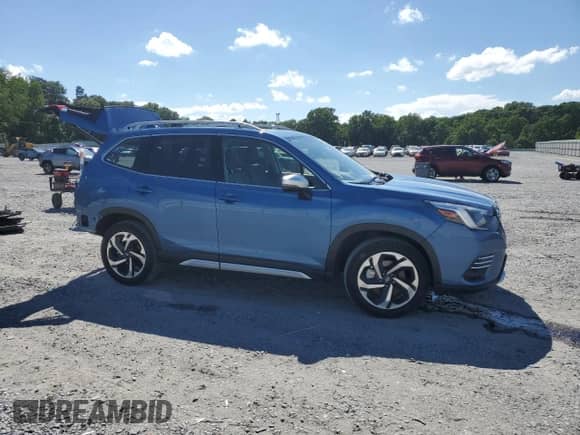 2023 Subaru Forester Touring z VIN JF2SKARC8PH545785, wystawiony jako Copart lot #61219105 z przebiegiem 9 841 mil mil oraz Szkoda całkowita • Salvage title. Historia ofert i sprzedaży dostępna na DreamBid. Obrazek 4.