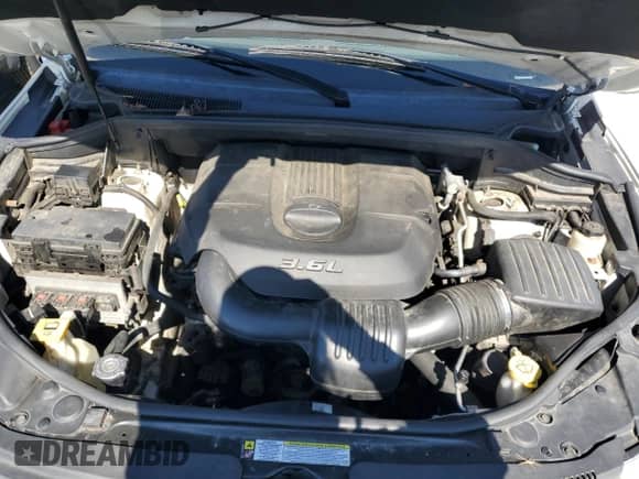 2011 Jeep Grand Cherokee 70th Anniversary z VIN 1J4RR4GG5BC543959, wystawiony jako Copart lot #84259425 z przebiegiem 192 320 mil mil oraz Szkoda całkowita • Salvage title. Historia ofert i sprzedaży dostępna na DreamBid. Obrazek 12.