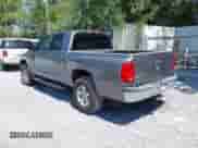 2005 Dodge Dakota SLT with VIN 1D7HE48N65S365506, listed as a IAAI auction lot 42588692 with 156,199 mi miles and . Bid and sale history available at DreamBid. Image 3.