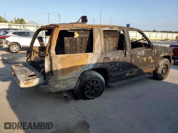 1997 Chevrolet Tahoe с VIN 1GNEK13RXVJ429428, выставлен на аукционе Copart как лот 70564004 с пробегом Не указан миль и На запчасти • Non repairable. История ставок и продаж доступна на DreamBid. Изображение 3.