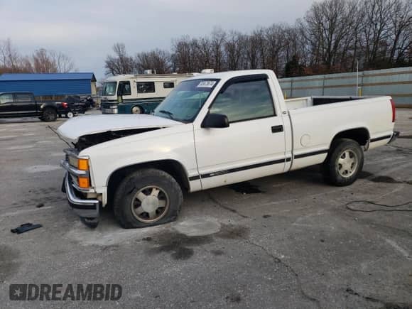 1997 Chevrolet Silverado 1500 with VIN 1GCEC14M2VZ244560, listed as a Copart auction lot 83473674 with 182,944 mi miles and Salvage title. Bid and sale history available at DreamBid. Image 1.