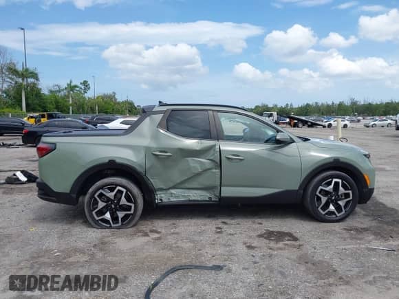 2024 Hyundai Santa Cruz Limited with VIN 5NTJEDDF0RH106316, listed as a IAAI auction lot 43081454 with 60,474 mi miles and . Bid and sale history available at DreamBid. Image 6.