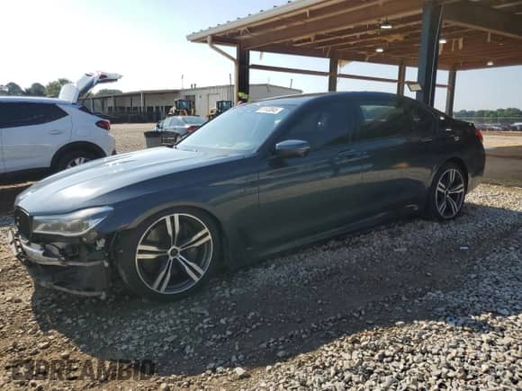 2016 BMW 7 Series 750i с VIN WBA7F0C57GGM20857, выставлен на аукционе Copart как лот 61143845 с пробегом 141 313 миль миль и Списание • Salvage title. История ставок и продаж доступна на DreamBid. Изображение 1.