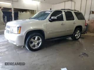 2013 Chevrolet Tahoe LTZ with VIN 1GNSKCE00DR330467, listed as a Copart auction lot 80821995 with 294,372 mi miles and Salvage title. Bid and sale history available at DreamBid. Image 1.